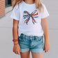 a little girl wearing a patriotic bow t - shirt