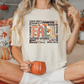 a woman sitting on a bed holding a pumpkin