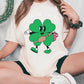 a woman in a st patrick's day t - shirt sitting on the floor