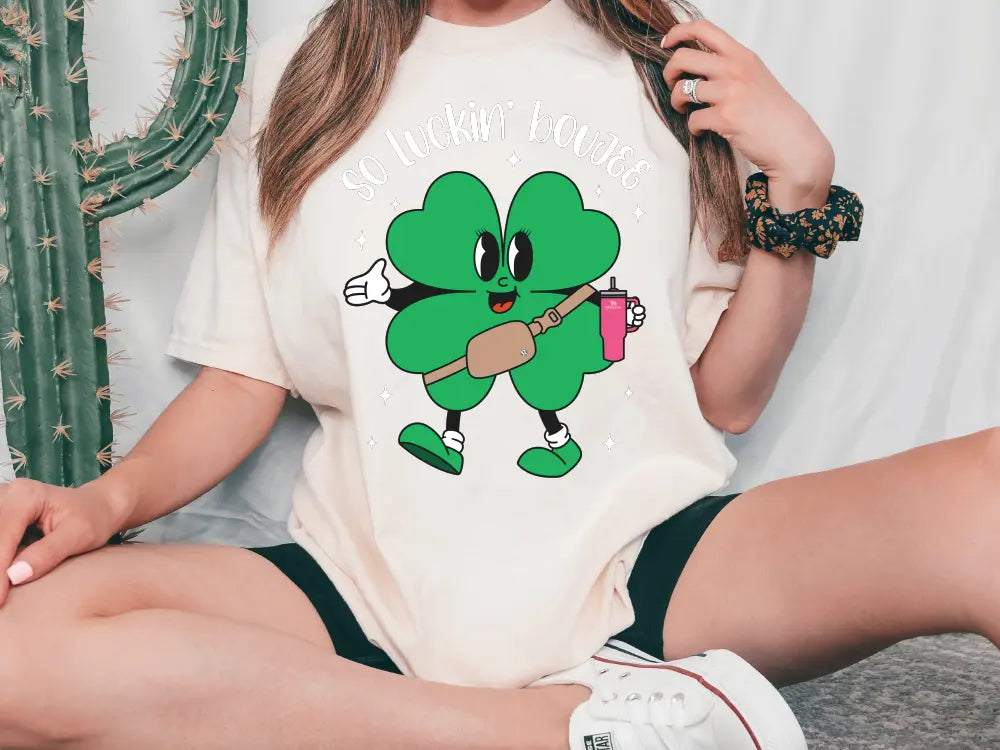 a woman in a st patrick's day t - shirt sitting on the floor