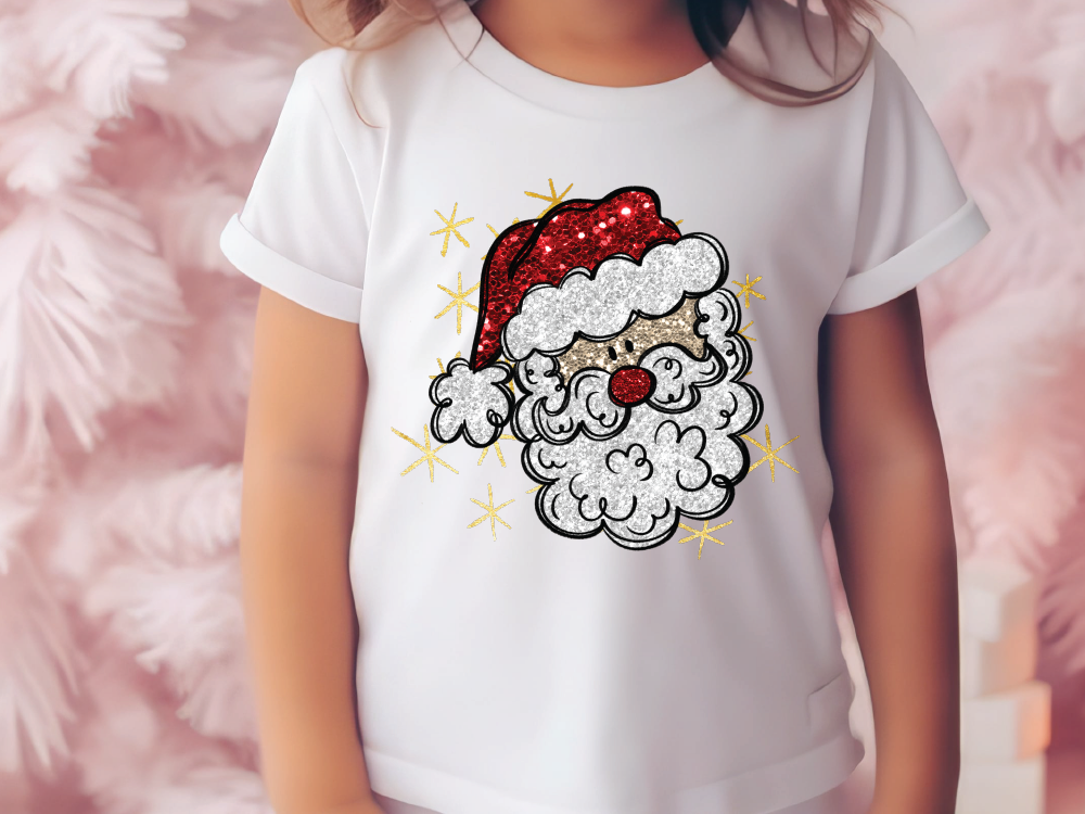a little girl wearing a santa claus shirt
