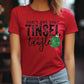 a woman wearing a red t - shirt that says don't get your tin