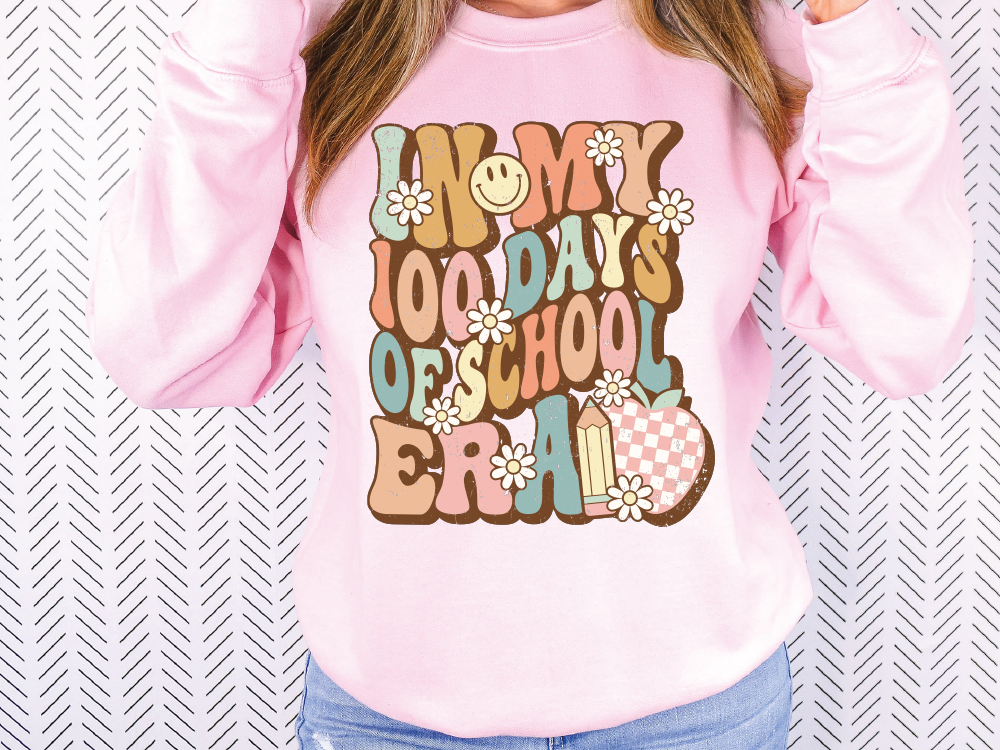 a woman wearing a pink sweatshirt that says, i love my today's os