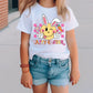 a little girl wearing a happy easter t - shirt