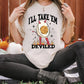a woman wearing a t - shirt that says i'll take em deviled