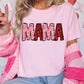 a woman wearing a pink shirt with the word mama written on it
