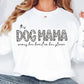 a woman wearing a white dogma sweatshirt and jeans