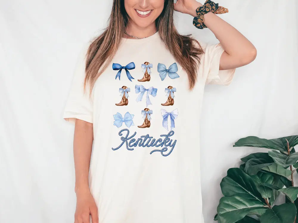 a woman wearing a t - shirt that says kentucky