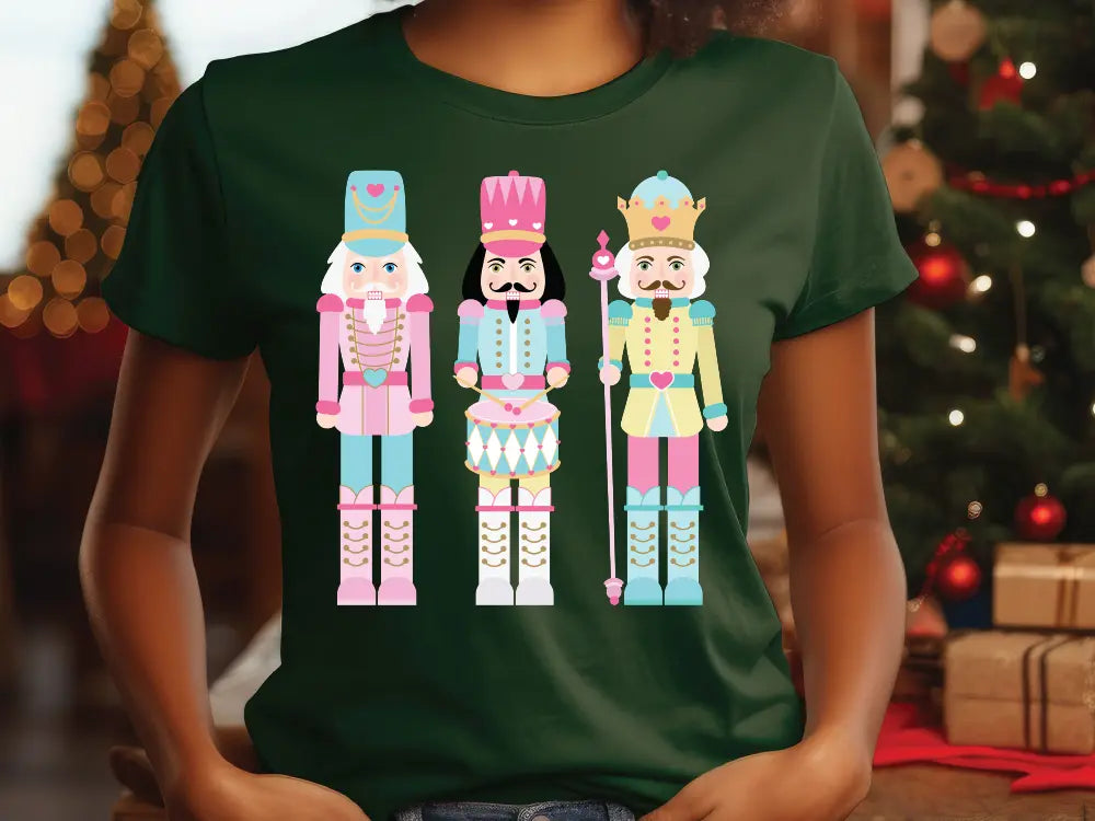 a woman wearing a green t - shirt with three nutcrackers on it