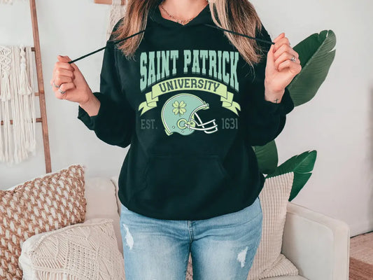 a woman wearing a saint patrick university hoodie