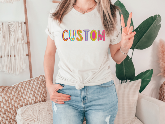 a woman wearing a t - shirt that says custom