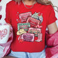 a woman in a red shirt holding a coffee mug