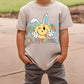 a young boy wearing a happy easter t - shirt