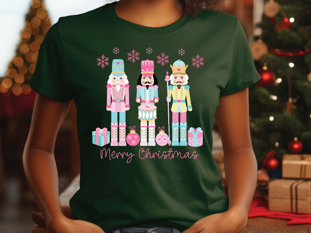 a woman wearing a green t - shirt with two nutcrackers on it