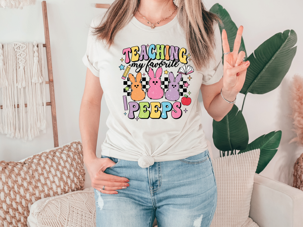 a woman wearing a tee shirt that says teaching is important