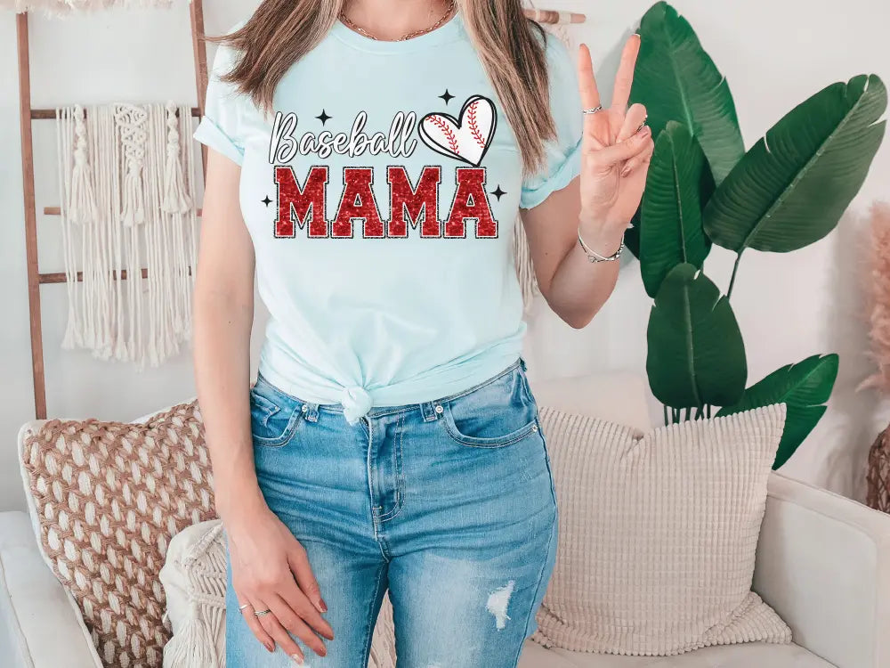 a woman standing in front of a couch holding a peace sign