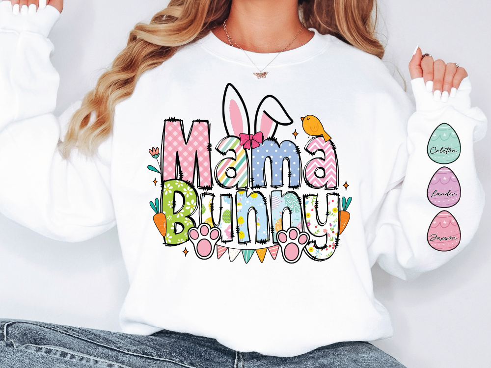 a woman wearing a white mama bunny sweatshirt