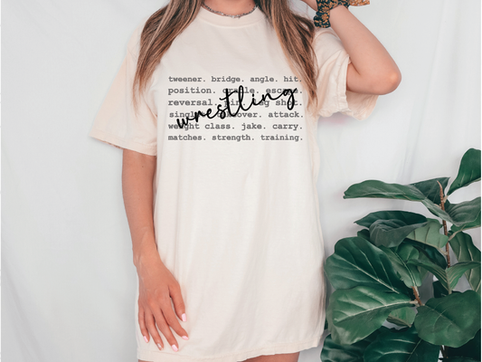 a woman wearing a t - shirt dress with words printed on it