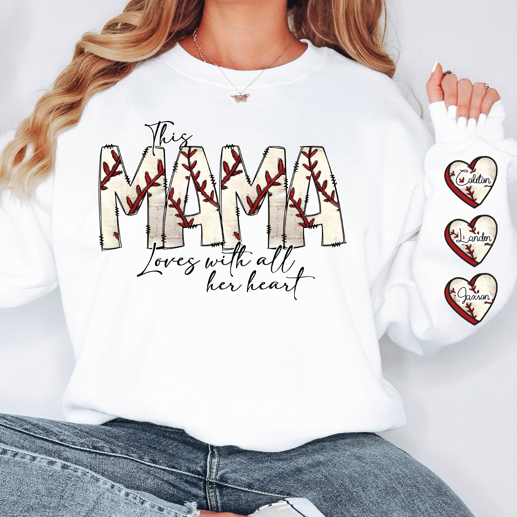 a woman wearing a white shirt that says the mama loves with all her heart