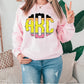 a woman wearing a pink sweatshirt with the number forty on it