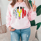 a woman wearing a pink sweatshirt with the word y on it