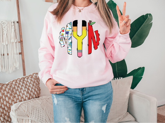 a woman wearing a pink sweatshirt with the word y on it