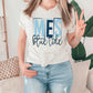 a woman wearing a t - shirt that says mes brunette