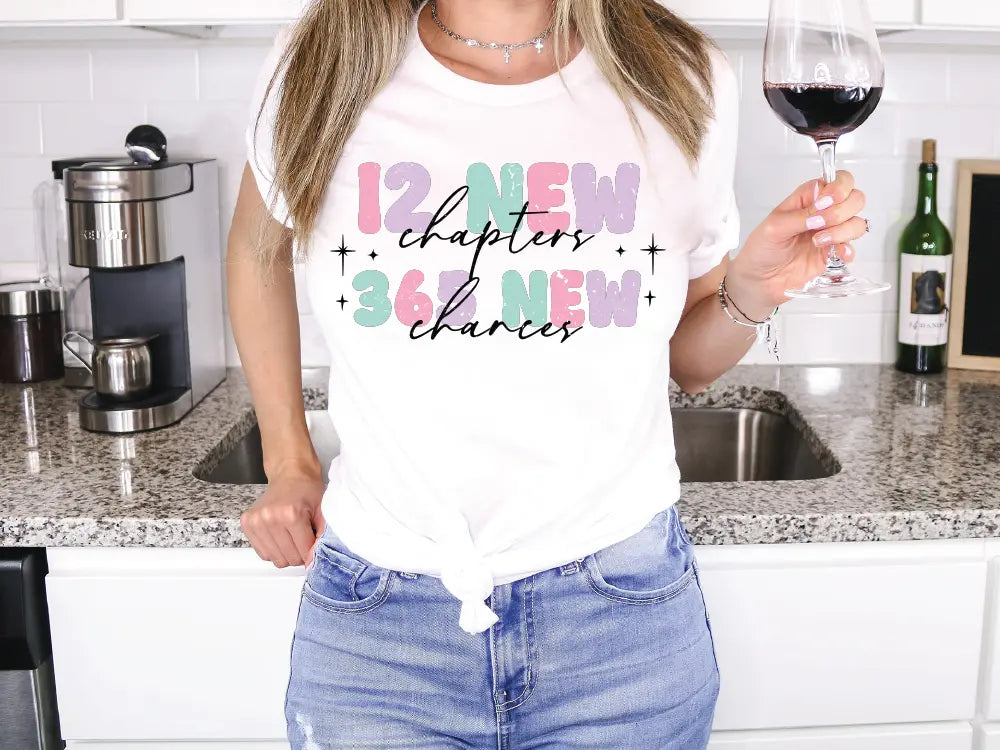 a woman holding a glass of wine in a kitchen