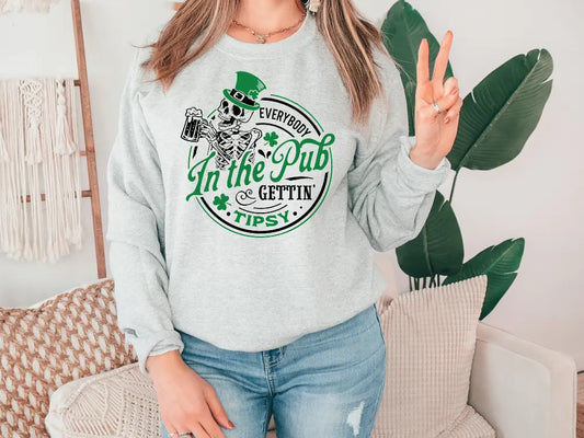 a woman wearing a st patrick's day sweatshirt