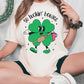 a woman in a st patrick's day t - shirt sitting on the floor