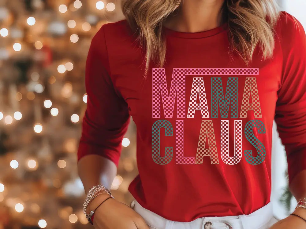 a woman wearing a red shirt with the words mama claus on it