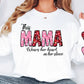 a woman wearing a white shirt with the words mama on it