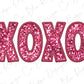 the word xoxo is made up of pink sequins